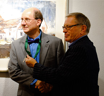 Professor Tony Curtis presenting the Glyndwr Medal to David Tress